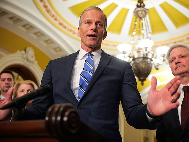 U.S. Senate Majority Leader John Thune (R-SD) accompanied by Sen. Tom Cotton (R-AR) (L), S
