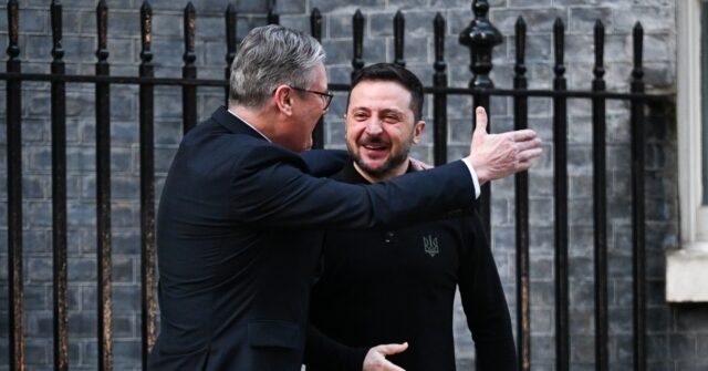 Zelensky Hugged by UK PM Starmer After Trump Dressing Down