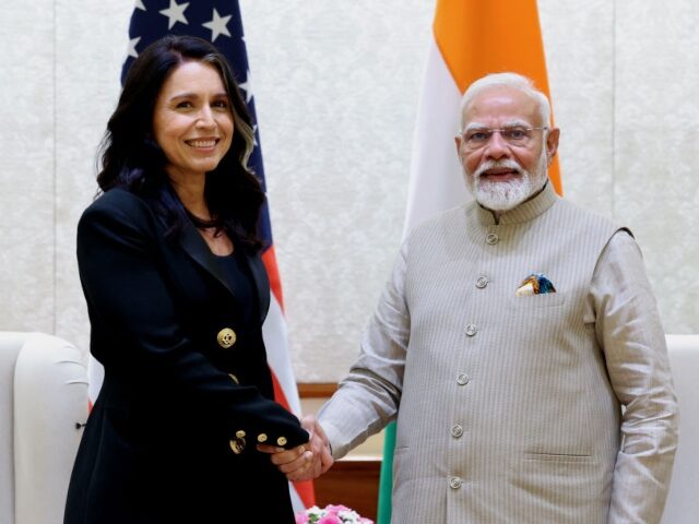 GettyImages-2205061043 NEW DELHI, INDIA - MARCH 17: US Director of National Intelligence Tulsi Gabbard (L) meets