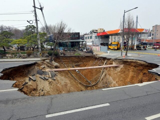 This photo taken on March 25, 2025 shows a road cave-in site in Seoul, South Korea. A road