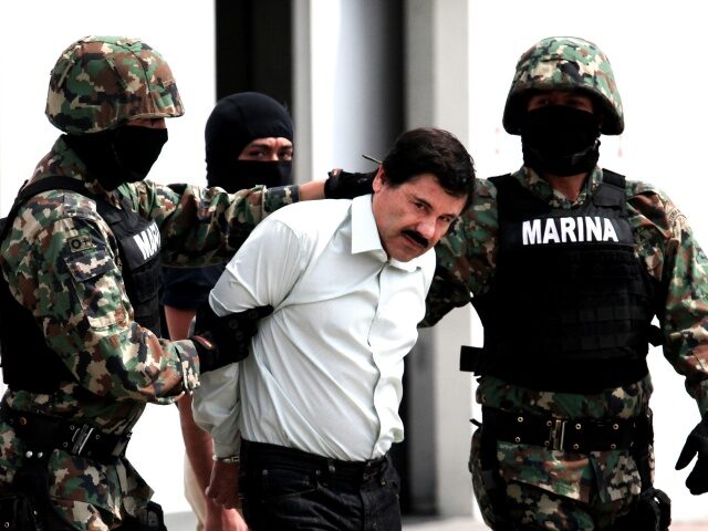 Mexican Navy soldiers escort Joaquin Guzman Loera (front), alias "El Chapo Guzman&quo