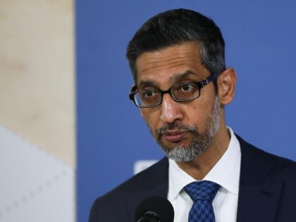 Google's Sundar Pichai with a pleading expression