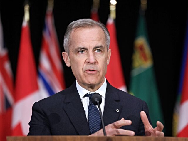 Canada's Prime Minister Mark Carney speaks during a press conference after the First Minis