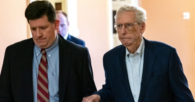 Mitch McConnell Appears to Need Aide's Help in Hearing Question