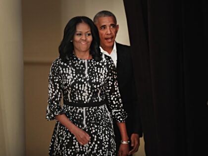 CHICAGO, IL - MAY 03: Former President Barack Obama and his wife Michelle arrive for a rou