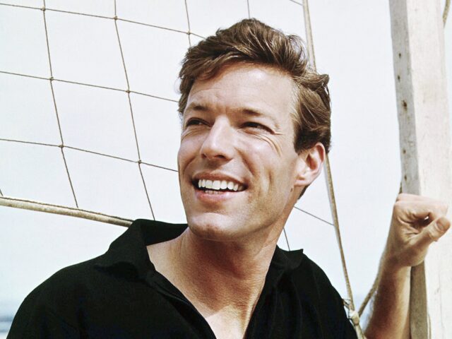American actor Richard Chamberlain at a game of volleyball, circa 1965. (Photo by Silver S