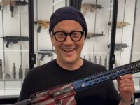 Comedian Rob Schneider Poses with AR-15: My ‘Anti-Tesla ⁩Arson Protection Device’