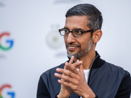 Sundar Pichai claps for AI