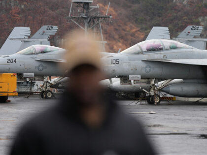 US F-18 Super Hornet fighter jets are seen on the flight deck of the Nimitz-class nuclear-