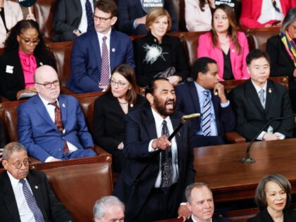 Washington, DC - March 4: Rep. Al Green (D-Texas) yells toward President Donald Trump as h