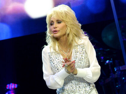 Dolly Parton performs during a concert to benefit Dolly's Imagination Library at The