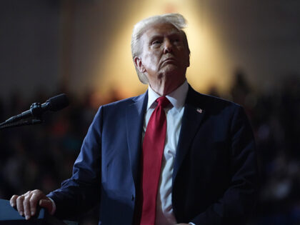 FILE - Republican presidential nominee former President Donald Trump watches a video scree