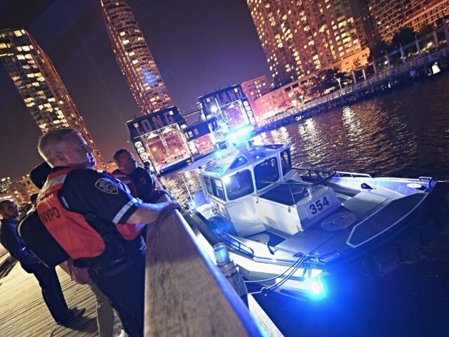 <> on August 25, 2014 in New York City. LONG ISLAND CITY, NY - AUGUST 25: Police rescue multiple people from The East River on Aug