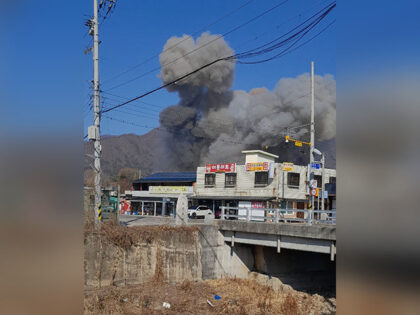 Smoke billows after a fighter jet dropped bombs on South Korea's civilian area by accident