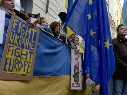 ROME, ITALY - MARCH 02: Leader of Azione party Carlo Calenda between Ukrainian flags and E