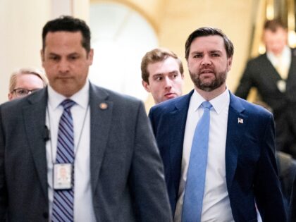 US Vice President JD Vance, center, arrives for a House Republican caucus meeting at the U