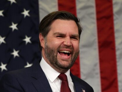 WASHINGTON, DC - MARCH 04: U.S. Vice President JD Vance shakes hands with Speaker of the H