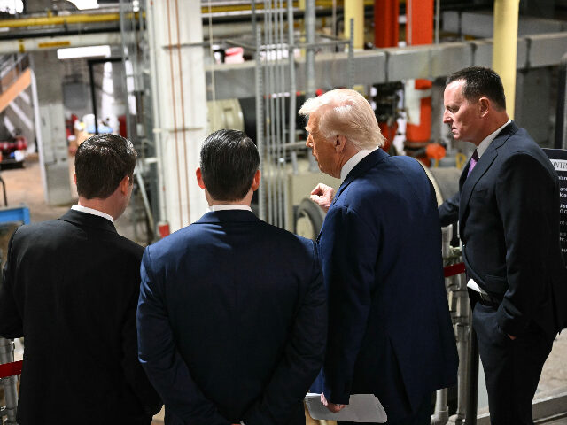 WASHINGTON, DC - MARCH 17: U.S. President Donald Trump views the power control room during