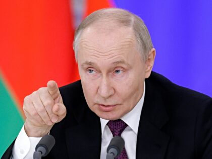 Russia's President Vladimir Putin speaks during a press conference following a meeting wit