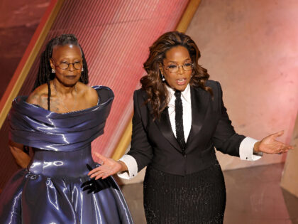 HOLLYWOOD, CALIFORNIA - MARCH 02: (L-R) Whoopi Goldberg and Oprah Winfrey speak onstage du