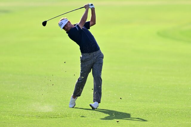 American Keith Mitchell plays a shot on the way to a share of the first-round lead in the