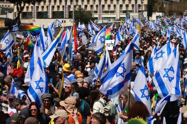 Anti-government demonstrators protest outside the Israeli prime minister's office in Jerus