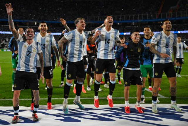 Argentina's players celebrate after thrashing Brazil 4-1 following their World Cup qualifi