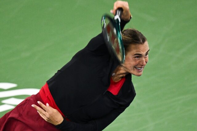 World number one Aryna Sabalenka serves on the way to a dominant semi-final victory over M