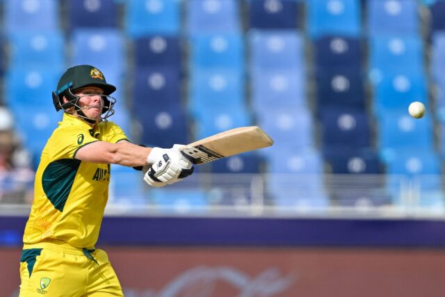 Australia's captain Steve Smith plays a shot against India