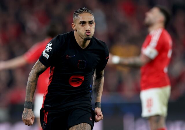 Barcelona's Brazilian forward Raphinha celebrates scoring against Benfica on Wednesday in