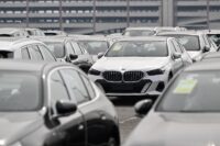 BMW expects big hit from tariffs after 2024 profits plunge