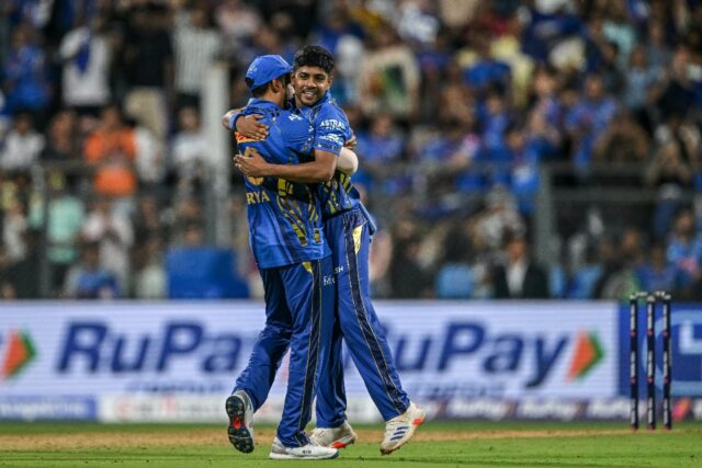 Breakthrough: Mumbai Indians' Ashwani Kumar (R) celebrates with Suryakumar Yadav after tak
