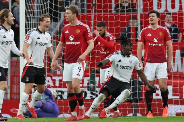 Calvin Bassey (2R) celebrates his FA Cup goal for Fulham against Manchester United at Old