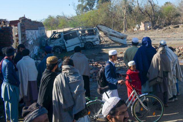 The death toll from a suicide car-bomb attack in northwestern Pakistan has risen to 18, in