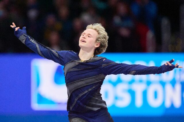 Defending champion Ilia Malinin on his way to victory in the short program