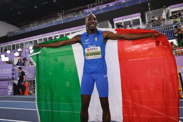 Italy’s Andy Diaz Hernandez celebrates after winning the men’s triple jump