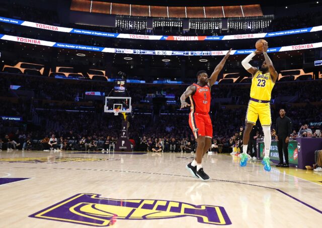 LeBron James drains a three-pointer to become the first NBA player in history to pass 50,0