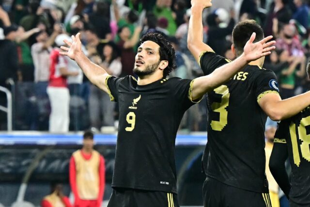 Mexico forward Raul Jimenez celebrates after scoring his team's winning penalty in the Nat