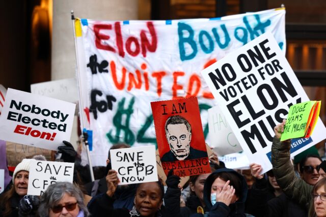 Protesters rally outside the Consumer Financial Protection Bureau which has been targeted