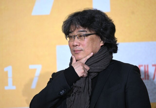 South Korean director Bong Joon-ho poses during a press conference in Seoul to promote hi