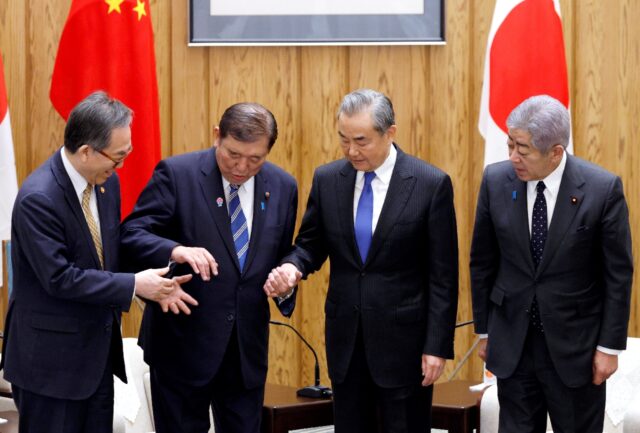 (L-R) South Korean Foreign Minister Cho Tae-yul, Japanese Prime Minister Shigeru Ishiba, C