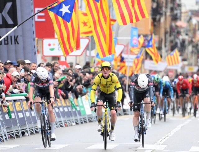 Team Visma's British rider Matthew Brennan (C) snatched victory in stage one of the Tour o
