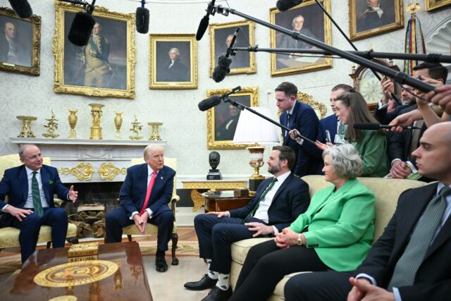 US President Donald Trump meets with Irish Prime Minister Micheal Martin (L) in the White