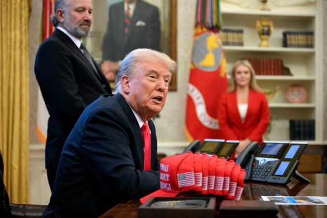 US President Donald Trump said tariffs on Canada, Mexico and China would proceed over an '