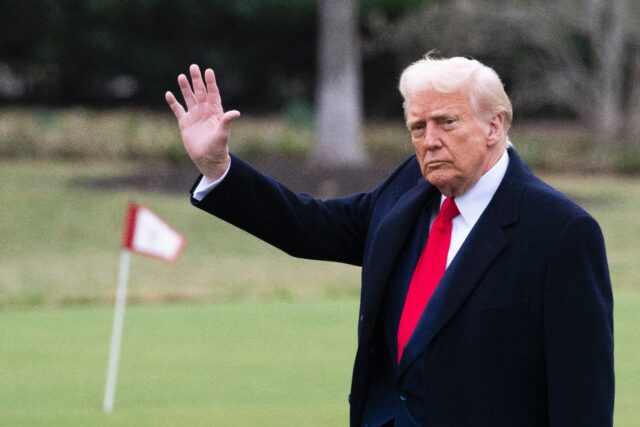 US President Donald Trump walks to board Marine One at the South Lawn of the White House o