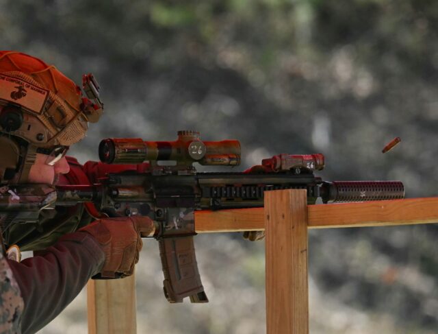 US Vice President JD Vance fires an M27 rifle at the Marine Corps Base in Quantico, Virgin