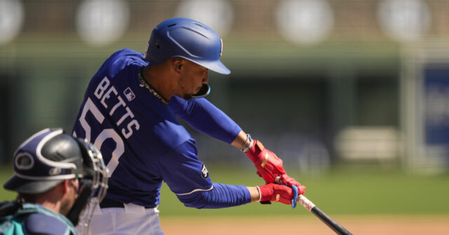 Dodgers' Betts dealing with illness in Japan, Roberts hopeful he'll be ...