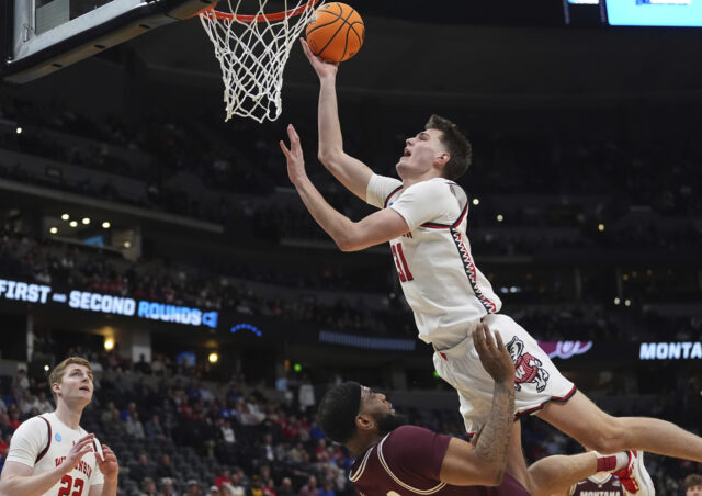 NCAA Montana Wisconsin Basketball The Associated Press