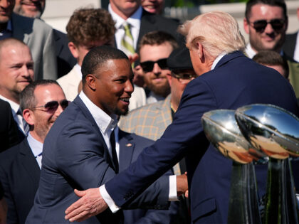WASHINGTON, DC - APRIL 28: U.S. President Donald Trump greets Philadelphia Eagles running
