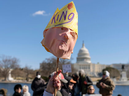 People take part in the "No Kings Day" protest on Presidents Day in Washington, in support